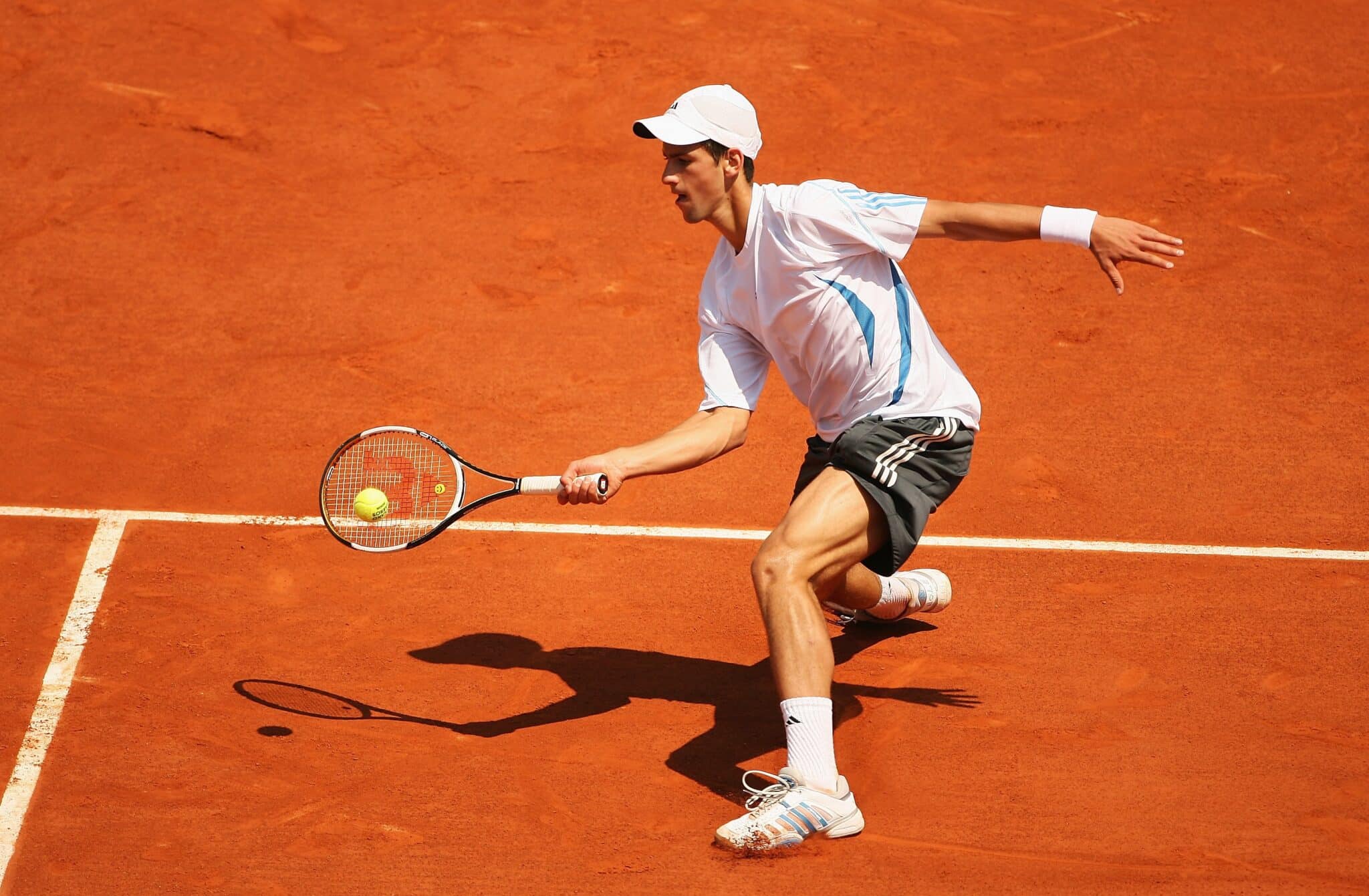 Novak Djokovic of Serbia and Montenegro in action against Rafael Nadal of Spain during day eleven of the French Open at Roland Garros