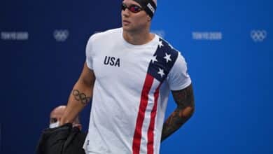 USA's Caeleb Dressel prepares to compete in a heat for the men's 50m freestyle swimming event during the Tokyo 2020 Olympic Games at the Tokyo Aquatics Centre in Tokyo on July 30, 2021.