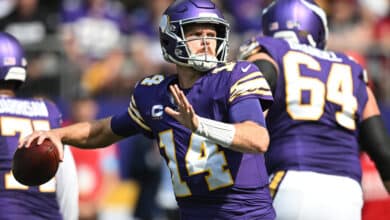 MINNEAPOLIS, MINNESOTA - SEPTEMBER 22: Quarterback Sam Darnold #14 of the Minnesota Vikings passes the ball in the second quarter of the game against the Houston Texans at U.S. Bank Stadium on September 22, 2024 in Minneapolis, Minnesota.