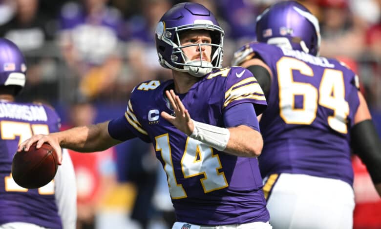 MINNEAPOLIS, MINNESOTA - SEPTEMBER 22: Quarterback Sam Darnold #14 of the Minnesota Vikings passes the ball in the second quarter of the game against the Houston Texans at U.S. Bank Stadium on September 22, 2024 in Minneapolis, Minnesota.