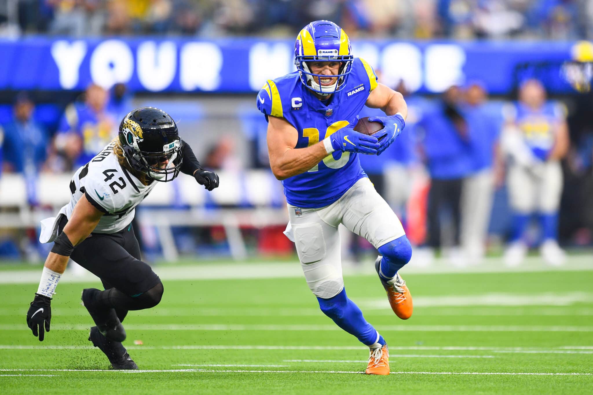 INGLEWOOD, CA - DECEMBER 05: Los Angeles Rams Wide Receiver Cooper Kupp (10) breaks free from Jacksonville Jaguars Safety Andrew Wingard (42) on his way to a touchdown during the NFL game between the Jacksonville Jaguars and the Los Angeles Rams on December 5, 2021, at SoFi Stadium in Inglewood, CA.