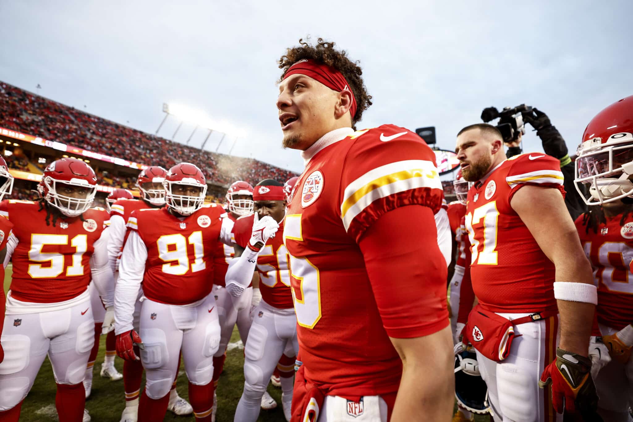 KANSAS CITY, MISSOURI - JANUARY 29: Patrick Mahomes #15 of the Kansas City Chiefs leads a huddle prior to the AFC Championship NFL football game between the Kansas City Chiefs and the Cincinnati Bengals at GEHA Field at Arrowhead Stadium on January 29, 2023 in Kansas City, Missouri.