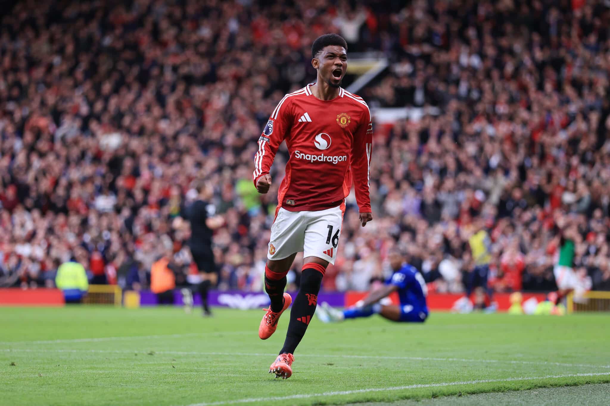 MANCHESTER, ENGLAND - DECEMBER 1: Amad Diallo of Manchester United celebrates their 2nd goal during the Premier League match between Manchester United FC and Everton FC at Old Trafford on December 1, 2024 in Manchester, England.
