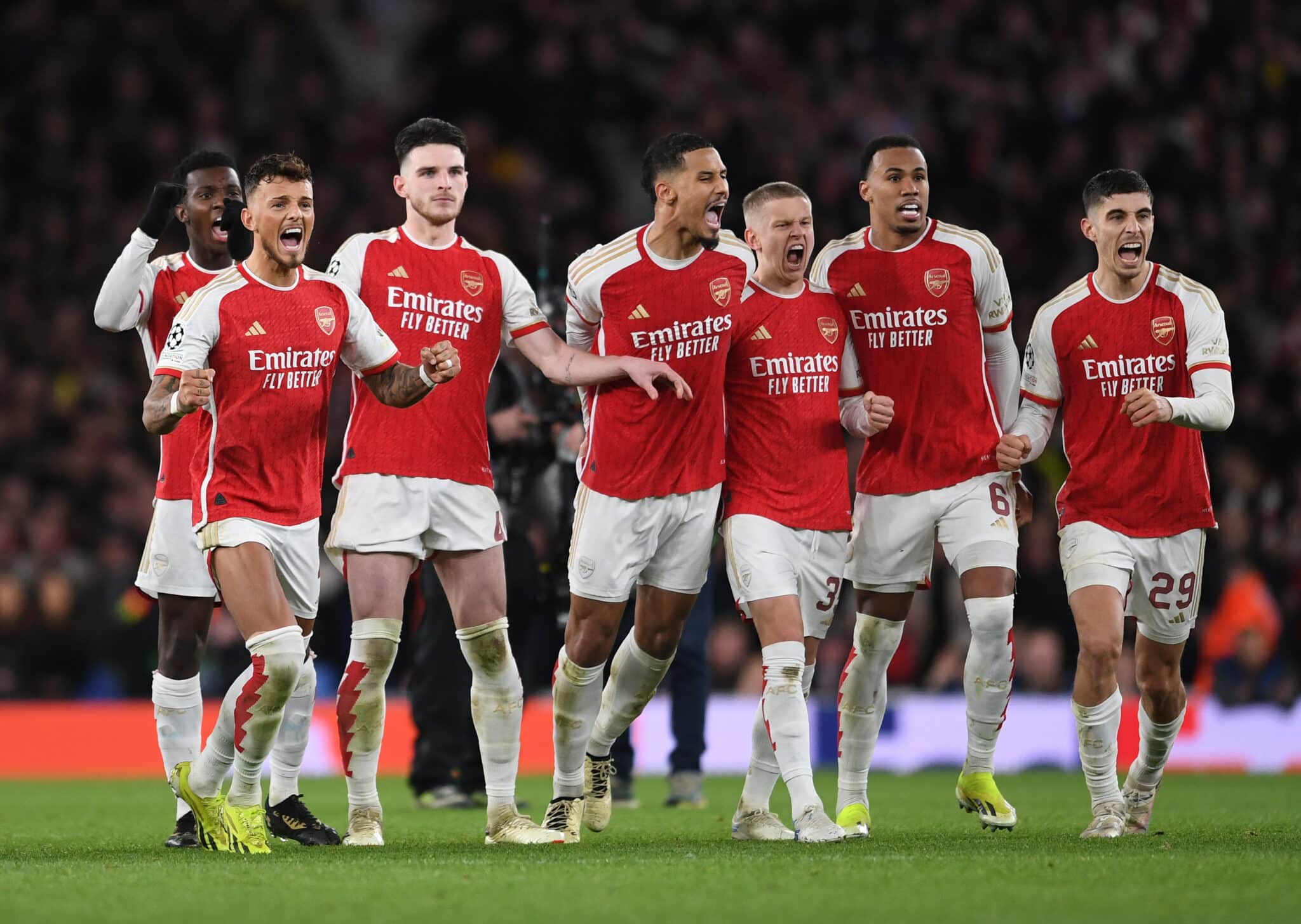 Ben White, Declan Rice, William Saliba, Oleksandr Zinchenko, Gabriel Magalhaes and Kai Havertz of Arsenal celebrate the 1st penalty save in the shoot out during the UEFA Champions League