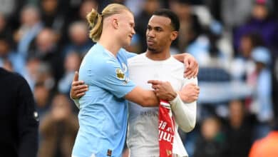 Erling Haaland of Manchester City interacts with Gabriel of Arsenal following the Premier League match between Manchester City and Arsenal FC at Etihad Stadium on March 31, 2024 in Manchester, England.
