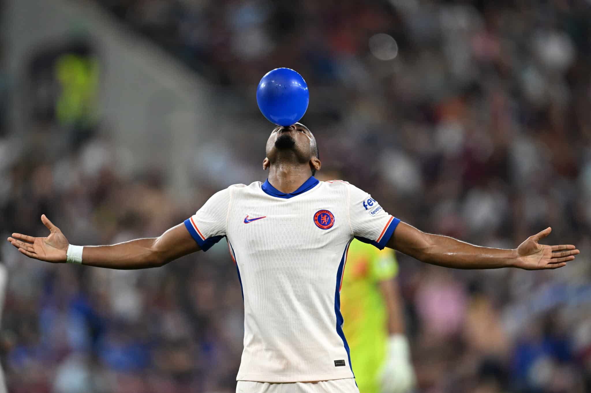 Christopher Nkunku of Chelsea celebrates scoring his team's first goal