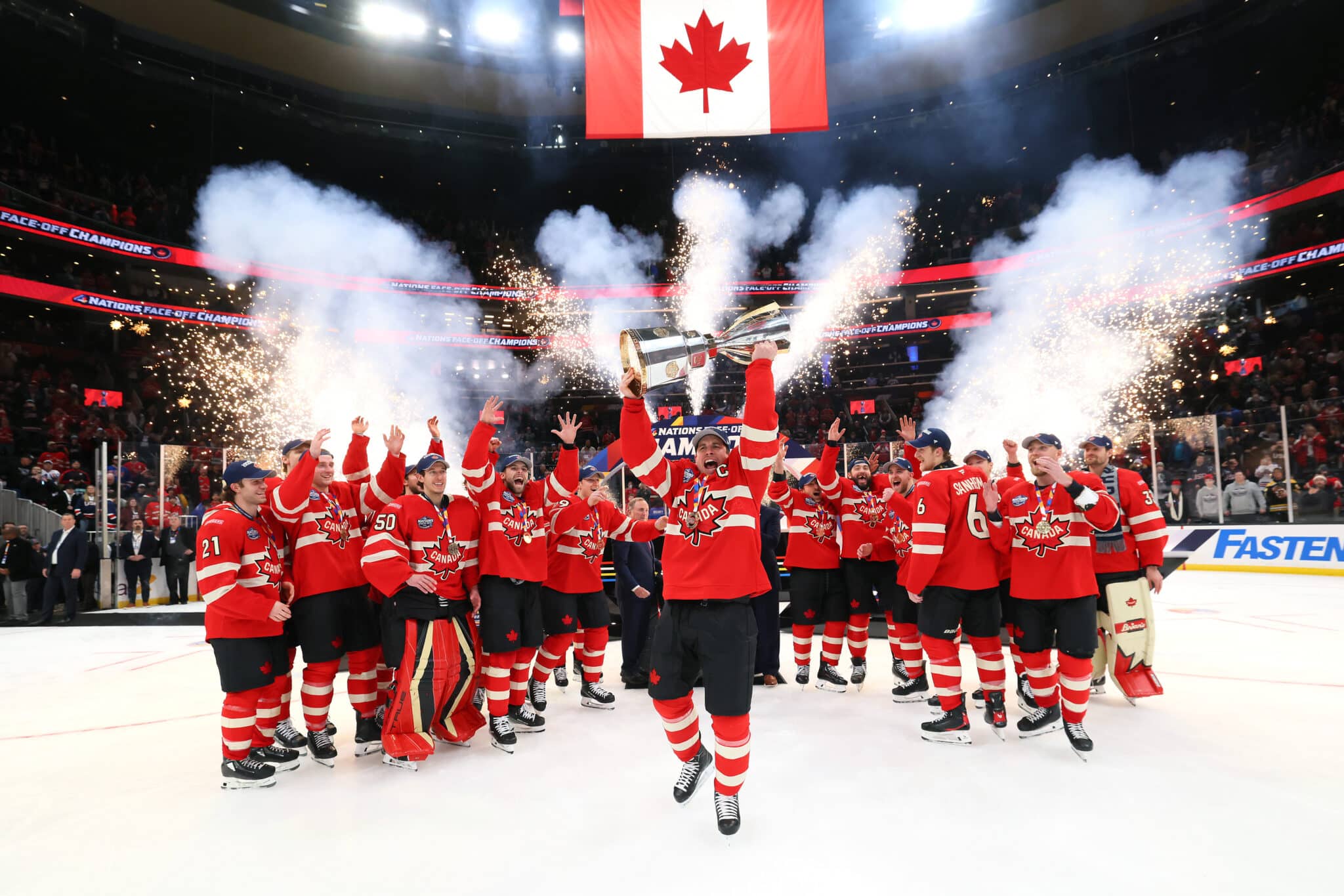 Sidney Crosby #87 of Team Canada celebrates with his teammates after defeating Team United States in overtime to win the NHL 4 Nations Face-Off Championship