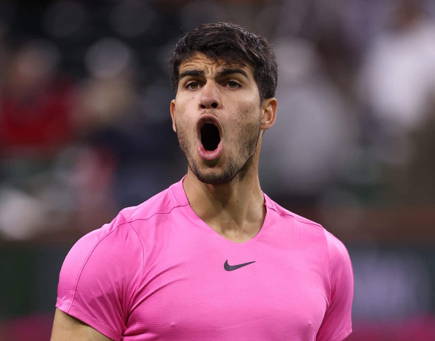 INDIAN WELLS, CALIFORNIA - MARCH 16: Carlos Alcaraz of Spain celebrates defeating Felix Auger-Aliassime of Canada in the quarter finals during the BNP Paribas Open on March 16, 2023 in Indian Wells, California.