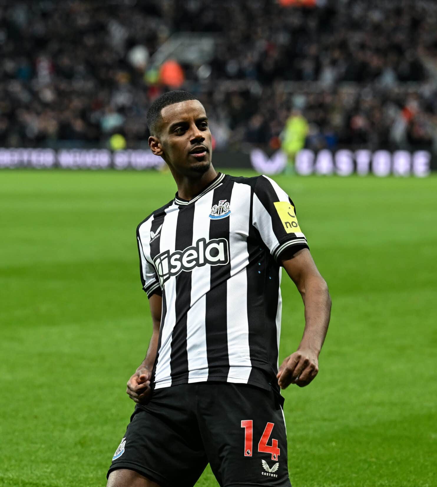 NEWCASTLE UPON TYNE, ENGLAND - JANUARY 13: Alexander Isak of Newcastle United (14) celebrates after scoring Newcastles first goal during the Premier League match between Newcastle United and Manchester City at St. James Park on January 13, 2024 in Newcastle upon Tyne, England.
