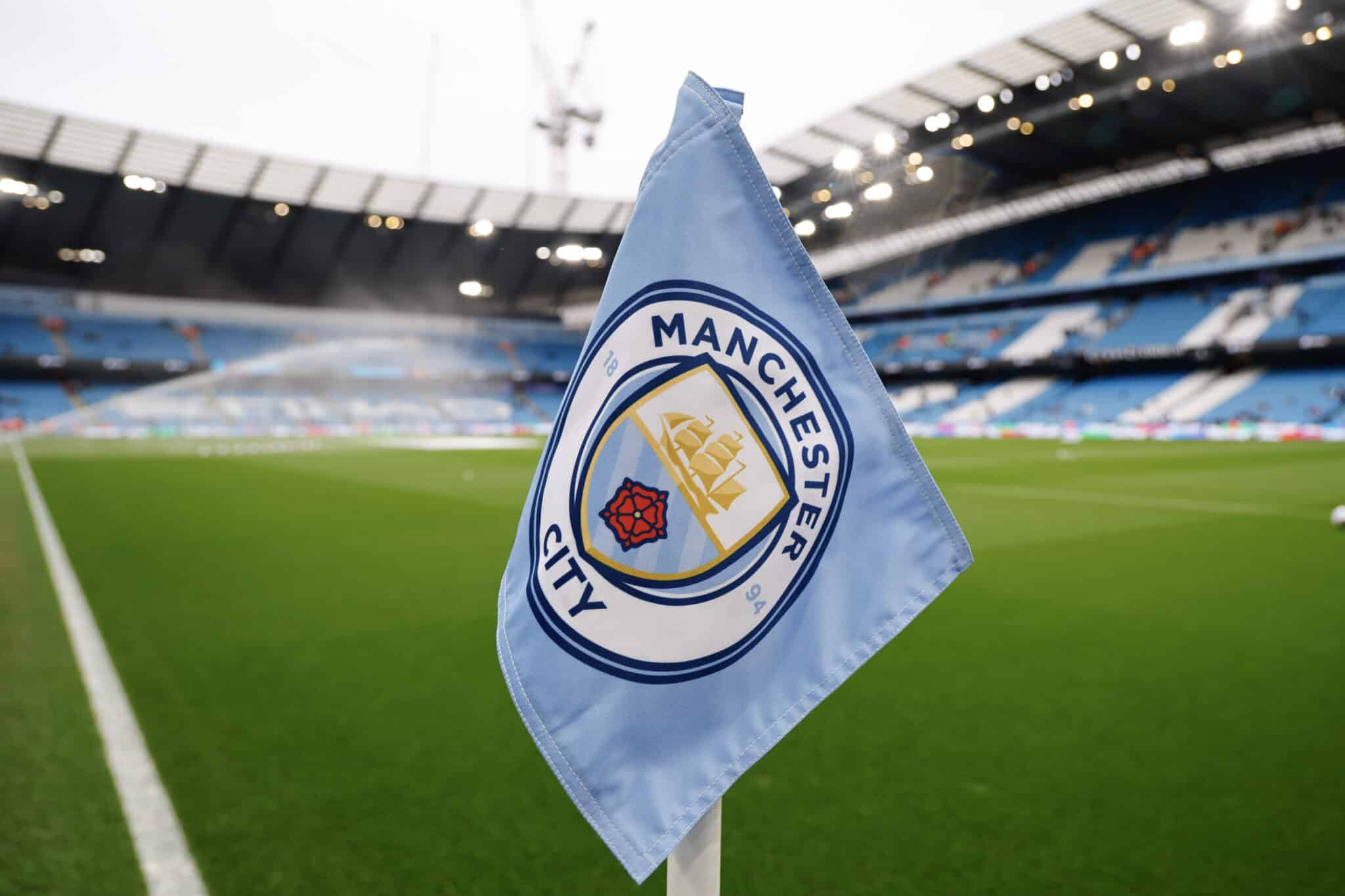 Manchester City logo on a corner flag inside the Ethiad Stadium