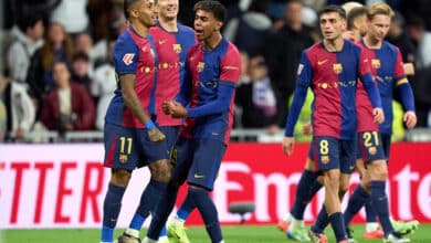 Raphinha of FC Barcelona celebrates scoring his team's fourth goal with teammates Robert Lewandowski and Lamine Yamal during the LaLiga match