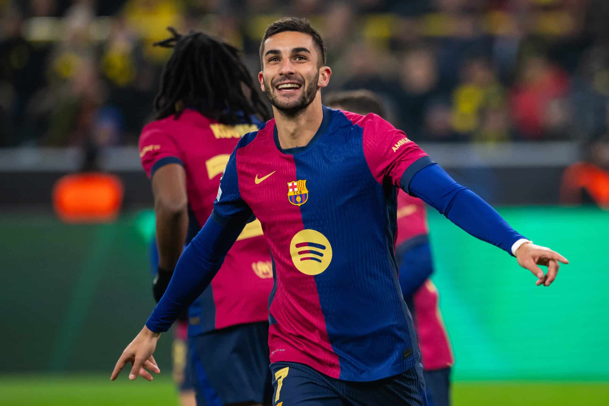 DORTMUND, GERMANY - DECEMBER 11: Ferran Torres of Barcelona celebrates after scoring his team's second goal during the UEFA Champions League 2024/25 League Phase MD6 match between Borussia Dortmund and FC Barcelona at BVB Stadion Dortmund in Dortmund, Germany on December 11, 2024.