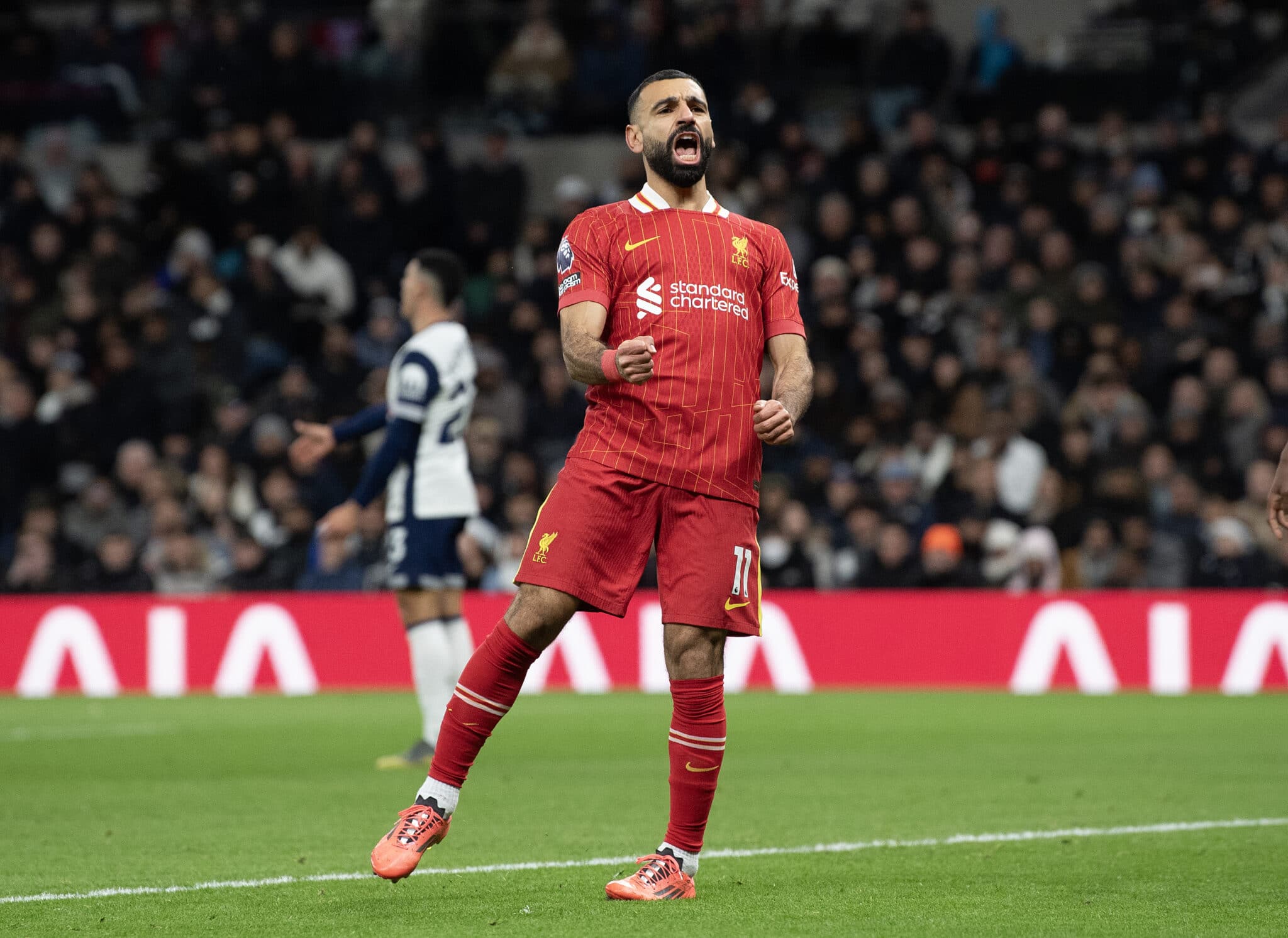 Mohamed Salah of Liverpool celebrates scoring the first of his two goals during the Premier League match