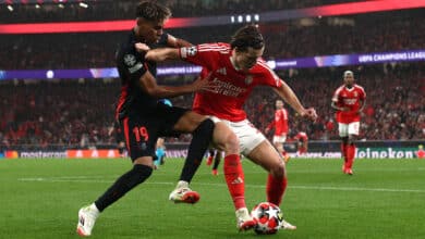 LISBON, PORTUGAL - JANUARY 21: Lamine Yamal of FC Barcelona challenges Alvaro Carreras of S.L Benfica during the UEFA Champions League 2024/25 League Phase MD7 match between SL Benfica and FC Barcelona at Estadio do SL Benfica on January 21, 2025 in Lisbon, Portugal.