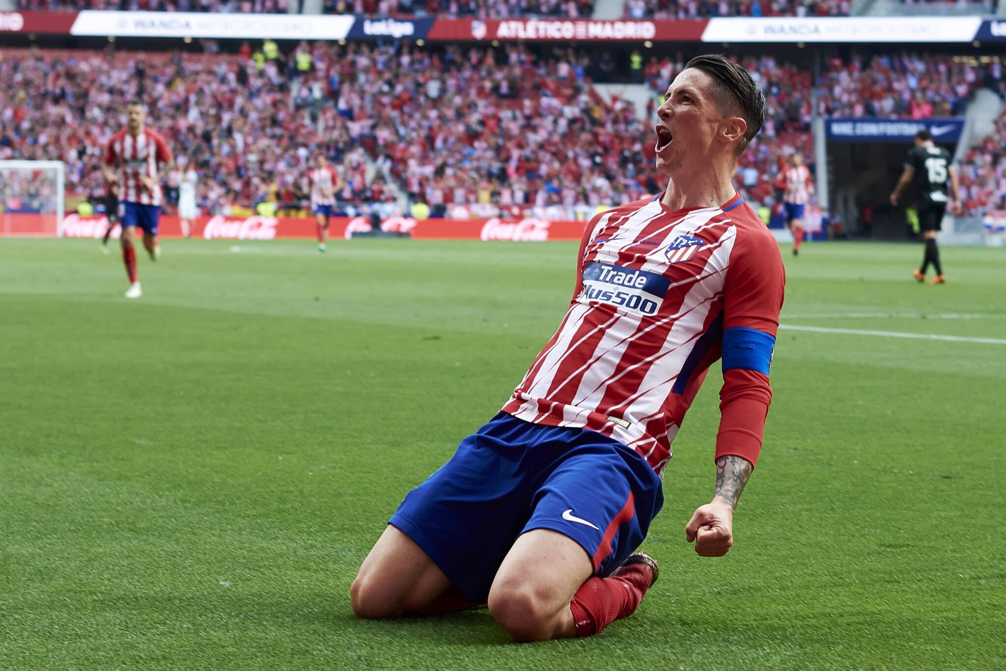 Fernando Torres of Atletico de Madrid celebrates scoring his team's first goal during the La Liga match between Atletico Madrid and Eibar