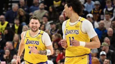 SALT LAKE CITY, UTAH - FEBRUARY 12: Luka Doncic #77 of the Los Angeles Lakers celebrates a play during the first half of a game against the Utah Jazz at Delta Center on February 12, 2025 in Salt Lake City, Utah.