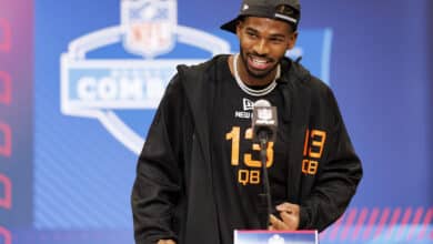 INDIANAPOLIS, INDIANA - FEBRUARY 28: Shedeur Sanders #QB13 of Colorado speaks at the podium during the 2025 NFL Combine at the Indiana Convention Center on February 28, 2025 in Indianapolis, Indiana.