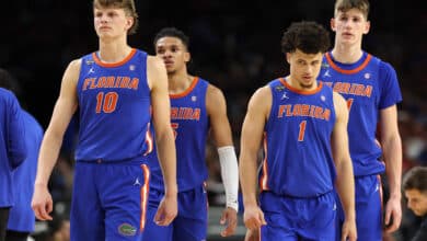SAN ANTONIO, TEXAS - APRIL 05: Thomas Haugh #10, Will Richard #5 and Walter Clayton Jr. #1 of the Florida Gators react against the Auburn Tigers during the second half in the Final Four game of the NCAA Men's Basketball Tournament at the Alamodome on April 05, 2025 in San Antonio, Texas.