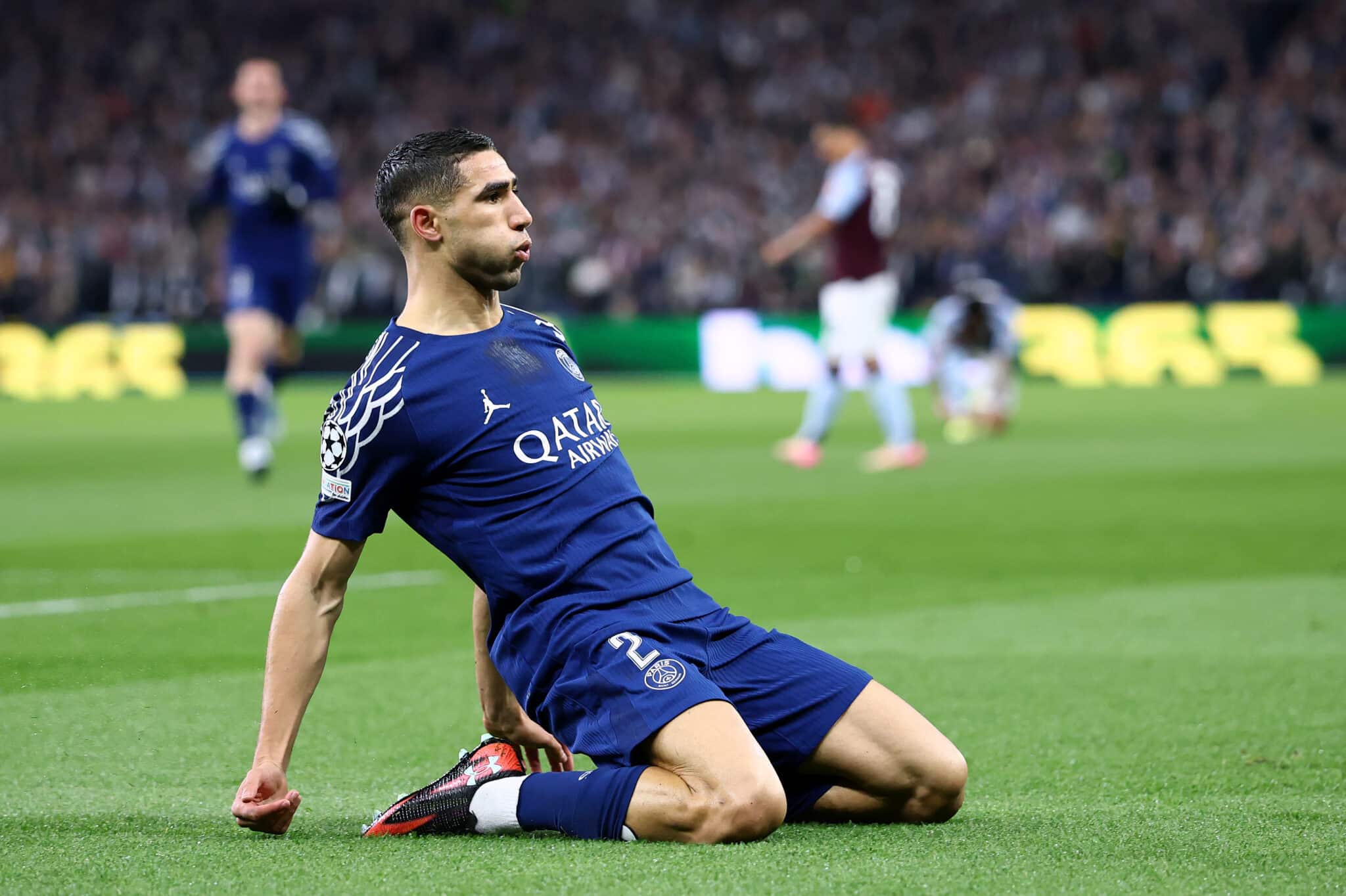 Achraf Hakimi of Paris Saint-Germain celebrates after scoring the opening goal during the UEFA Champions League 2024/25 Quarter Final Second Leg match between Aston Villa FC and Paris Saint-Germain at Villa Park on April 15, 2025 in Birmingham, England.