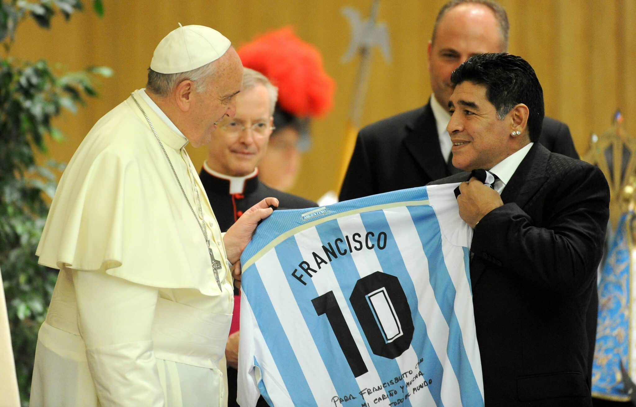 Pope Francis meets Diego Maradona during an audience with the players of the 'Partita Interreligiosa