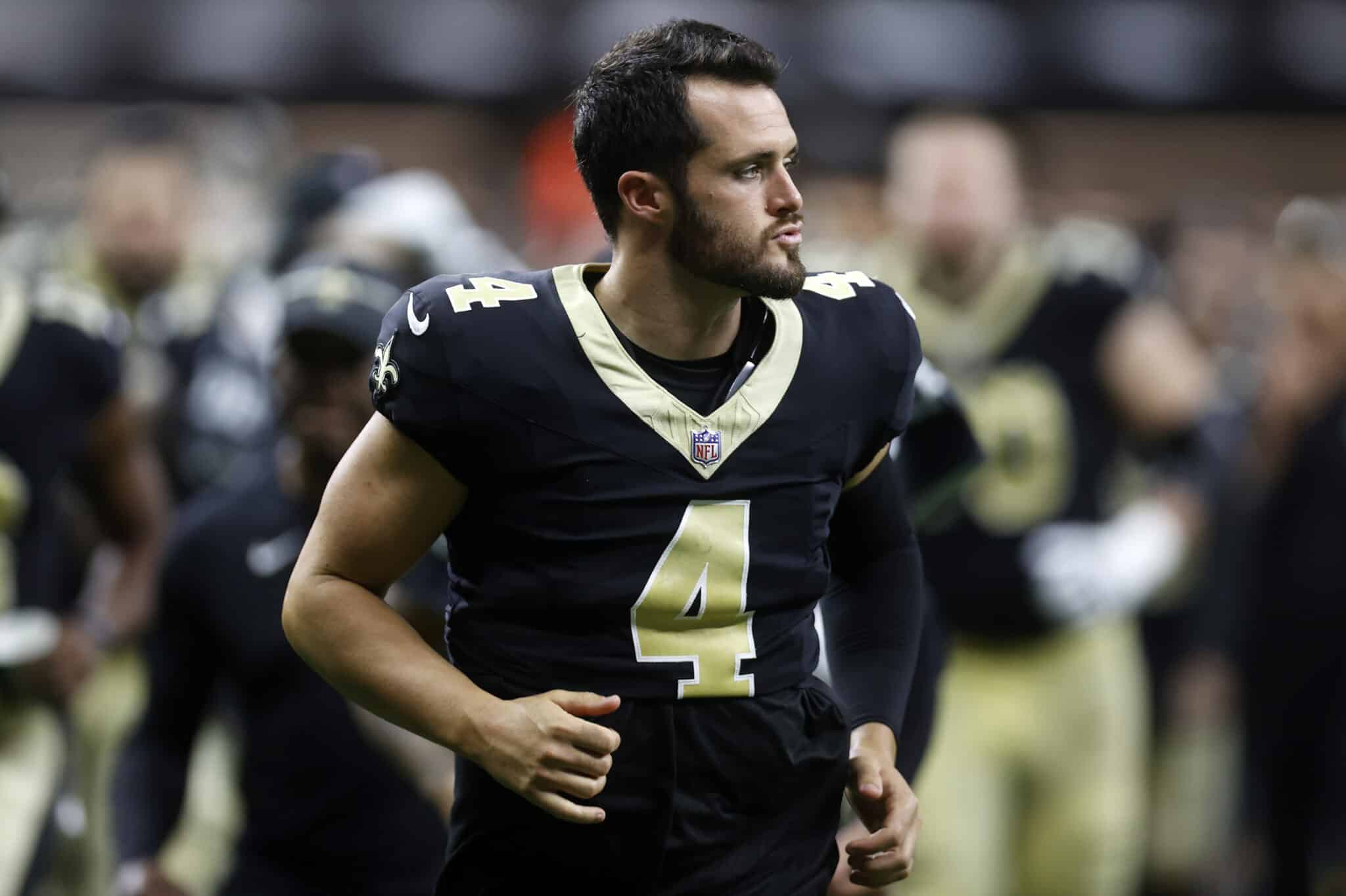 Derek Carr #4 of the New Orleans Saints looks on during a preseason game at Caesars Superdome on August 13, 2023 in New Orleans, Louisiana.