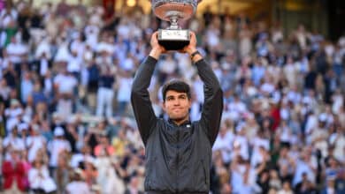 Carlos Alcaraz of Spain celebrates with the winners trophy after victory against Alexander Zverev