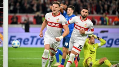 The Stuttgart players with scorer Ermedin Demirovic and Deniz Undav celebrate the 1:1 goal in stoppage time together, with beaten Hoffenheim.