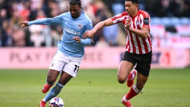 Haji Wright of Coventry City holds off the challenge of Jobe Bellingham of Sunderland