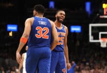 Mikal Bridges #25 of the New York Knicks celebrates with Karl-Anthony Towns #32 during the second half against the Boston Celtics
