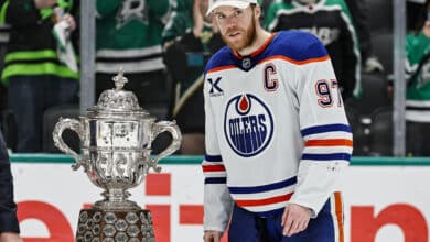 DALLAS, TX - MAY 29: Edmonton Oilers center Connor McDavid (97) accepts the Clarence S. Campbell Trophy after game 5 of the Western Conference Final between the Dallas Stars and the Edmonton Oilers on May 29, 2025 at American Airlines Center in Dallas, Texas.