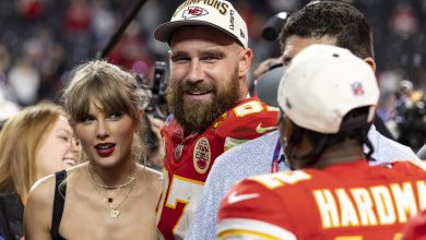 LAS VEGAS, NEVADA - FEBRUARY 11: Travis Kelce #87 of the Kansas City Chiefs and Taylor Swift react as they see Mecole Hardman Jr. #12 of the Kansas City Chiefs following the NFL Super Bowl 58 football game between the San Francisco 49ers and the Kansas City Chiefs at Allegiant Stadium on February 11, 2024 in Las Vegas, Nevada.