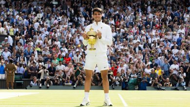 LONDON, ENGLAND - JULY 14: Carlos Alcaraz of Spain holds the trophy after defeating Novak Djokovic of Serbia at the Mens Singles Final against at The Wimbledon Lawn Tennis Championship at the All England Lawn and Tennis Club at Wimbledon on July 14th, 2024 in London, England.