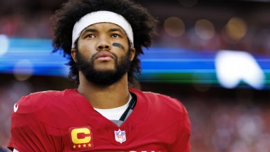 GLENDALE, ARIZONA - JANUARY 5: Quarterback Kyler Murray #1 of the Arizona Cardinals stands on the sidelines during the national anthem prior to an NFL football game against the San Francisco 49ers at State Farm Stadium on January 5, 2025 in Glendale, Arizona.