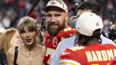 LAS VEGAS, NEVADA - FEBRUARY 11: Travis Kelce #87 of the Kansas City Chiefs and Taylor Swift react as they see Mecole Hardman Jr. #12 of the Kansas City Chiefs following the NFL Super Bowl 58 football game between the San Francisco 49ers and the Kansas City Chiefs at Allegiant Stadium on February 11, 2024 in Las Vegas, Nevada.