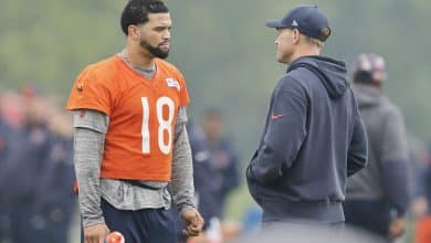LAKE FOREST, ILLINOIS - JUNE 04: Caleb Williams #18 of the Chicago Bears talks with head coach Ben Johnson during Chicago Bears OTA Offseason Workout at Halas Hall on June 04, 2025 in Lake Forest, Illinois.