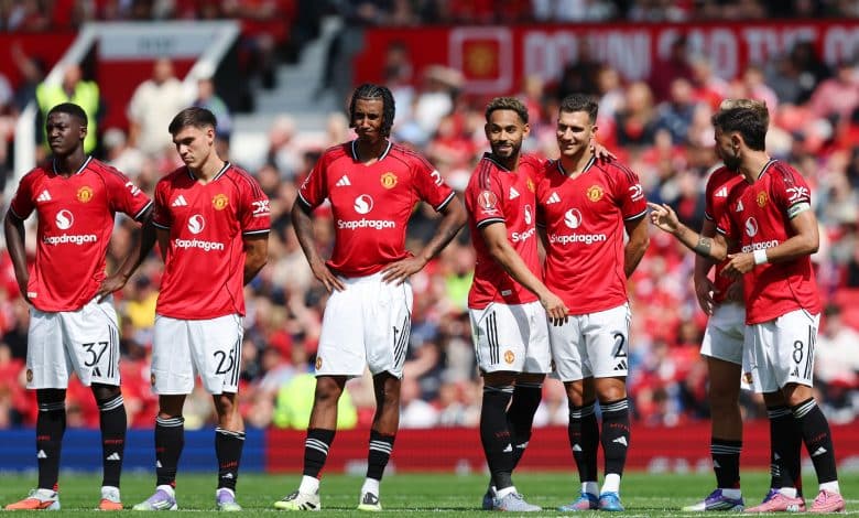 MANCHESTER, ENGLAND - AUGUST 09: Matheus Cunha and Diogo Dalot of Manchester United react during the penalty shootout during the pre-season friendly match between Manchester United and ACF Fiorentina at Old Trafford on August 09, 2025 in Manchester, England.