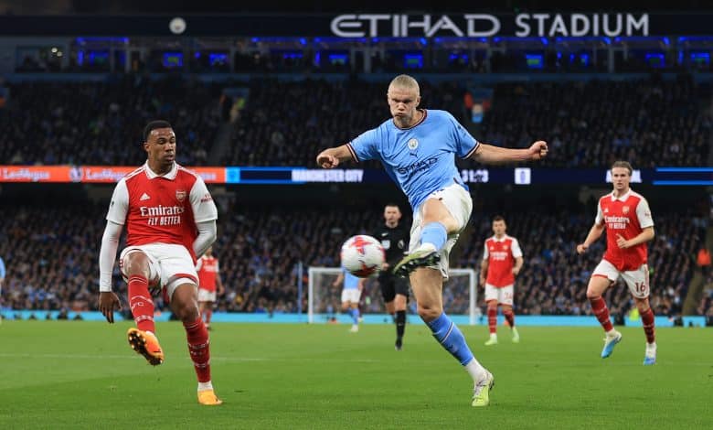 MANCHESTER, ENGLAND - APRIL 26: Gabriel of Arsenal can only watch as Erling Haaland of Manchester City shoots during the Premier League match between Manchester City and Arsenal FC at Etihad Stadium on April 26, 2023 in Manchester, United Kingdom.