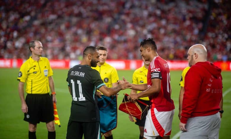 COLUMBIA, SOUTH CAROLINA - AUGUST 03: Casemiro of Manchester United and Mohamed Salah of Liverpool FC walk out ahead of the pre season friendly match between Manchester United v Liverpool FC at Williams-Brice Stadium on August 03, 2024 in Columbia, South Carolina.