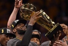 Cleveland Cavaliers' LeBron James (23) holds up the Larry O'Brien trophy after defeating the Golden State Warriors in Game 7 of the NBA Finals at Oracle Arena in Oakland, Calif., on Sunday, June 19, 2016. The Cleveland Cavaliers defeated the Golden State Warriors 93-89 to win the NBA championship.
