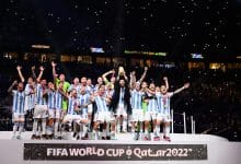 Lionel Messi of Argentina (C) celebrate with their FIFA World Cup Qatar 2022 trophy