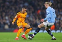 MANCHESTER, ENGLAND - FEBRUARY 11: Kylian Mbappe of Real Madrid is challenged by Erling Haland of Manchester City during the UEFA Champions League 2024/25 League Knockout Play-off first leg match between Manchester City and Real Madrid C.F. at Manchester City Stadium on February 11, 2025 in Manchester, England.