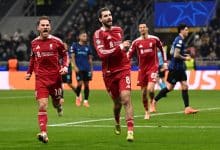 MILAN, ITALY - DECEMBER 09: (THE SUN OUT, THE SUN ON SUNDAY OUT ) Dominik Szoboszlai of Liverpool celebrates scoring his team's first goal from the penalty spot during the UEFA Champions League 2025/26 League Phase MD6 match between FC Internazionale Milano and Liverpool FC at Stadio San Siro on December 09, 2025 in Milan, Italy.