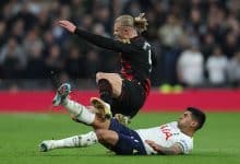Tottenham Hotspur's Argentinian defender Cristian Romero (R) commits a foul on Manchester City's Norwegian striker Erling Haaland (L) and received a yellow card during the English Premier League football match between Tottenham Hotspur and Manchester City at Tottenham Hotspur Stadium in London, on February 5, 2023. - - RESTRICTED TO EDITORIAL USE. No use with unauthorized audio, video, data, fixture lists, club/league logos or 'live' services. Online in-match use limited to 120 images. An additional 40 images may be used in extra time. No video emulation. Social media in-match use limited to 120 images. An additional 40 images may be used in extra time. No use in betting publications, games or single club/league/player publications. (Photo by Adrian DENNIS / AFP) / RESTRICTED TO EDITORIAL USE. No use with unauthorized audio, video, data, fixture lists, club/league logos or 'live' services. Online in-match use limited to 120 images. An additional 40 images may be used in extra time. No video emulation. Social media in-match use limited to 120 images. An additional 40 images may be used in extra time. No use in betting publications, games or single club/league/player publications. / RESTRICTED TO EDITORIAL USE. No use with unauthorized audio, video, data, fixture lists, club/league logos or 'live' services. Online in-match use limited to 120 images. An additional 40 images may be used in extra time. No video emulation. Social media in-match use limited to 120 images. An additional 40 images may be used in extra time. No use in betting publications, games or single club/league/player publications.