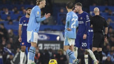 LONDON, ENGLAND - NOVEMBER 12: Former team-mates Erling Haaland of Manchester City and Cole Palmer of Chelsea exchange words at the re-start after Palmer scores from the spot to make it 4-4 during the Premier League match between Chelsea FC and Manchester City at Stamford Bridge on November 12, 2023 in London, England.