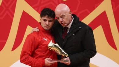 Morocco's forward #10 Brahim Diaz receives the Golden Boot from FIFA President Gianni Infantino during presentation at the end of the Africa Cup of Nations (CAN) final football match between Senegal and Morocco at the Prince Moulay Abdellah Stadium in Rabat on January 18, 2026.