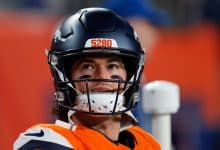 DENVER, CO - DECEMBER 21: Jarrett Stidham #8 of the Denver Broncos looks on from the bench during the fourth quarter against the Jacksonville Jaguars at Empower Field at Mile High on December 21, 2025 in Denver, Colorado.