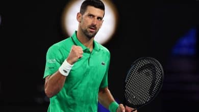 Serbia's Novak Djokovic reacts on a point to Netherlands' Botic van de Zandschulp during their men's singles match on day seven of the Australian Open tennis tournament in Melbourne on January 24, 2026.