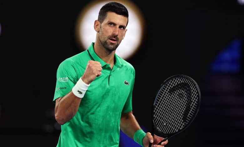 Serbia's Novak Djokovic reacts on a point to Netherlands' Botic van de Zandschulp during their men's singles match on day seven of the Australian Open tennis tournament in Melbourne on January 24, 2026.