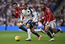 LONDON, ENGLAND - NOVEMBER 8: Xavi Simons of Tottenham Hotspurs and Noussair Mazraoui of Manchester United F.C. battle for a ball during the Premier League match between Tottenham Hotspur and Manchester United at Tottenham Hotspur Stadium on November 8, 2025 in London, England.