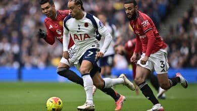 LONDON, ENGLAND - NOVEMBER 8: Xavi Simons of Tottenham Hotspurs and Noussair Mazraoui of Manchester United F.C. battle for a ball during the Premier League match between Tottenham Hotspur and Manchester United at Tottenham Hotspur Stadium on November 8, 2025 in London, England.